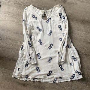 Cute floral dress with a semi open back.